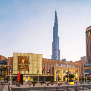 Dubai, United Arab Emirates - August 25, 2020: Dubai mall main entrance panoramic view with Burj Khalifa in rising in the background. Largest shopping mall by area and one of the main attractions in Dubai, UAE